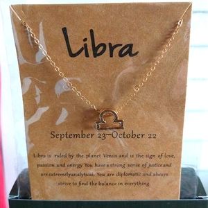 Gold astrological sign necklace